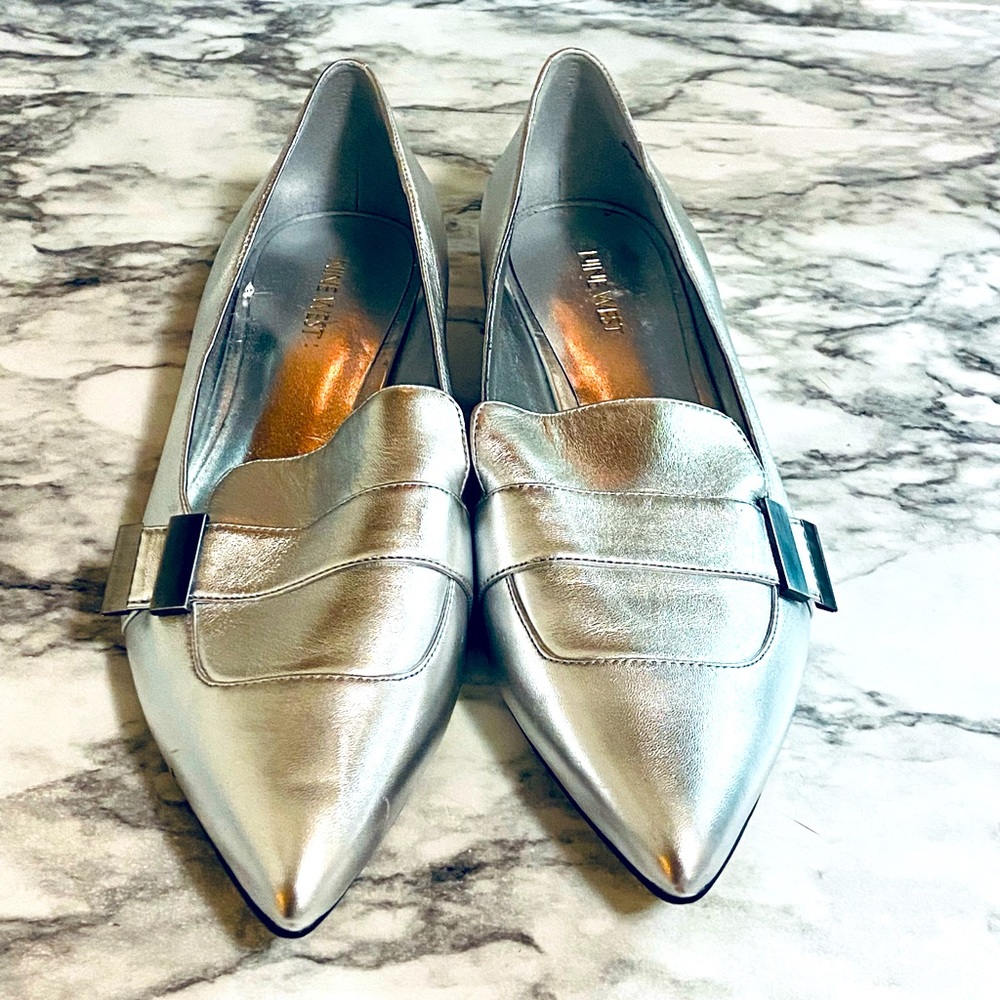 Silver pointed toe flats by Nine West